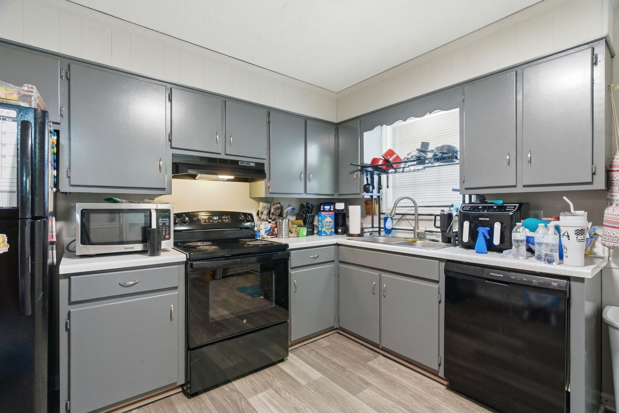 111 Gayla Court Portland, TN 37148 - Photo 34 of 47 a kitchen with a sink and cabinets