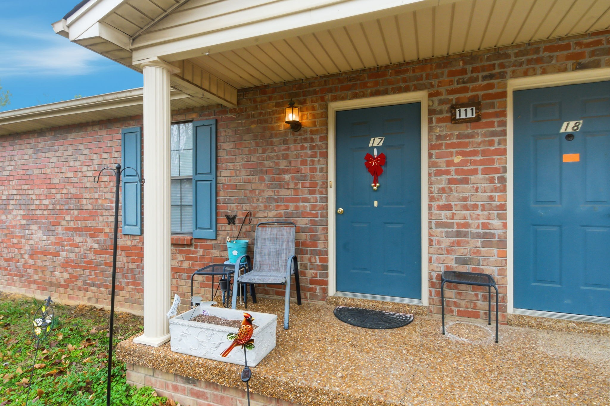 111 Gayla Court Portland, TN 37148 - Photo 5 of 47 a building outdoor space with patio furniture and potted plants
