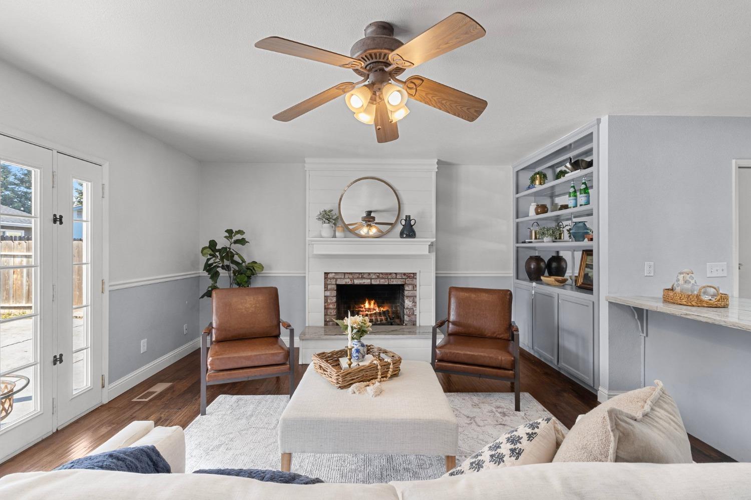 1600 Jacquelyn Way Modesto, CA 95355 - Photo 1 of 1 a living room with furniture and a fireplace