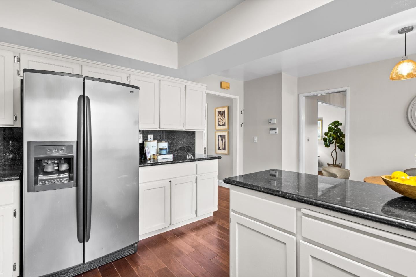 775 Steuben Drive Sunnyvale, CA 94087 - Photo 11 of 37 a kitchen with stainless steel appliances granite countertop a refrigerator and a counter space