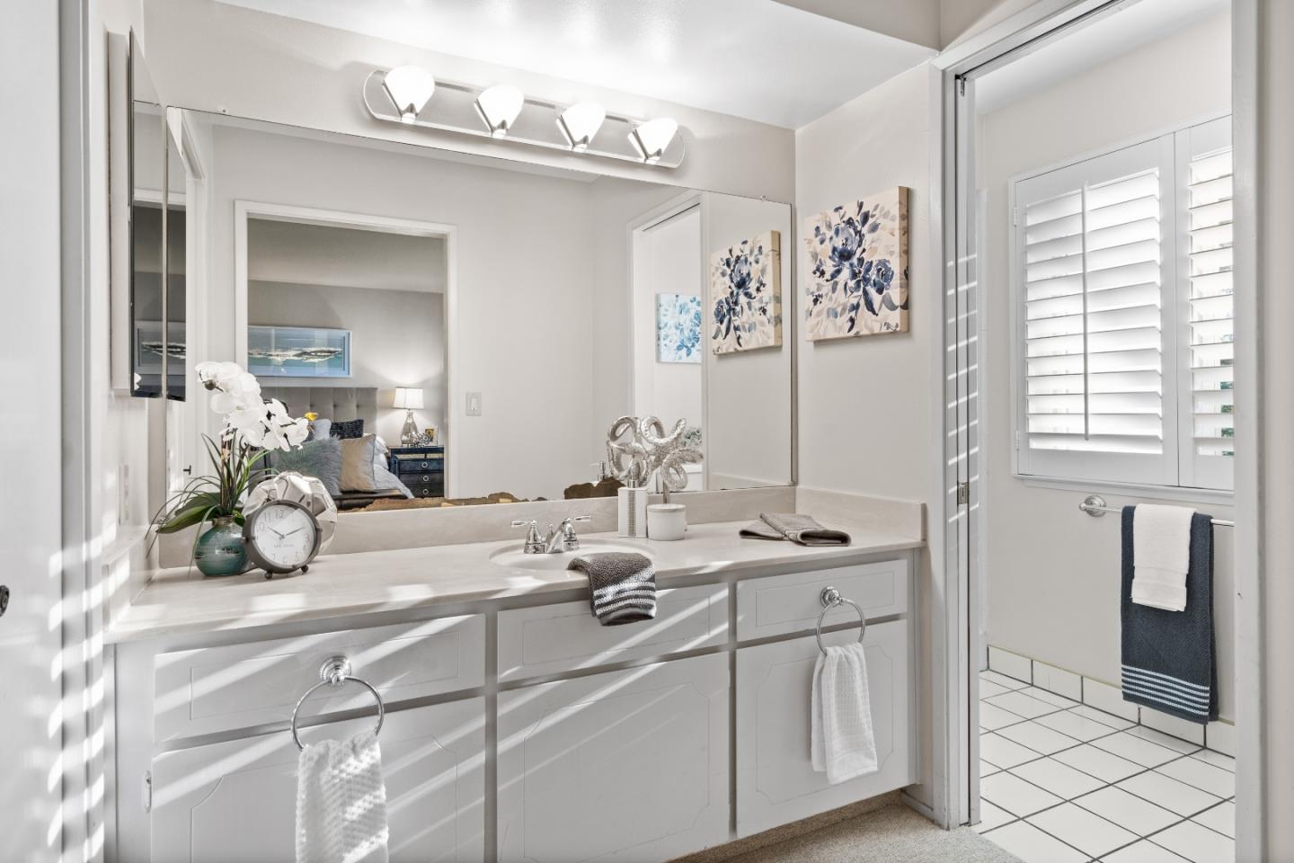 775 Steuben Drive Sunnyvale, CA 94087 - Photo 21 of 37 a bathroom with a sink and a mirror