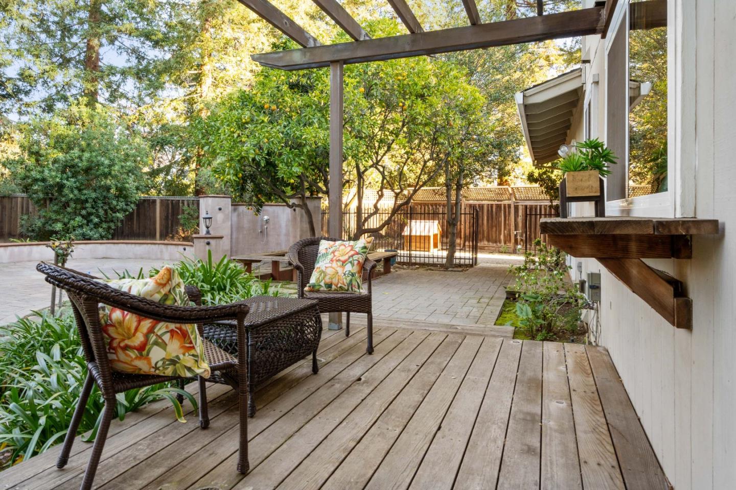 775 Steuben Drive Sunnyvale, CA 94087 - Photo 35 of 37 a roof deck with table and chairs and wooden floor