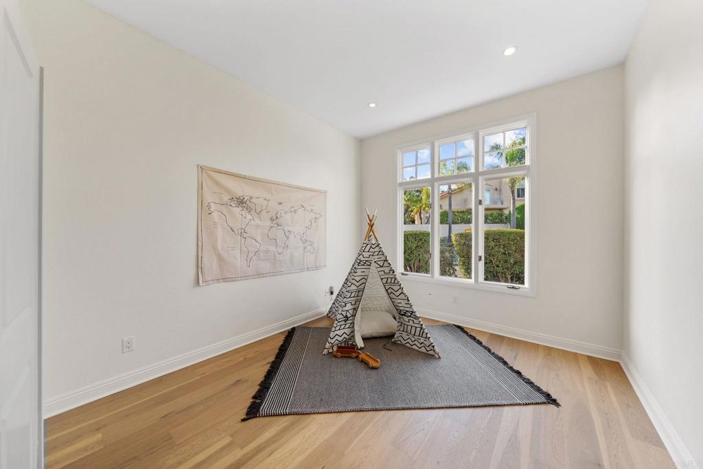 1838 Samoa Way Oceanside, CA 92054 - Photo 11 of 40 a view of a room with furniture wooden floor and windows