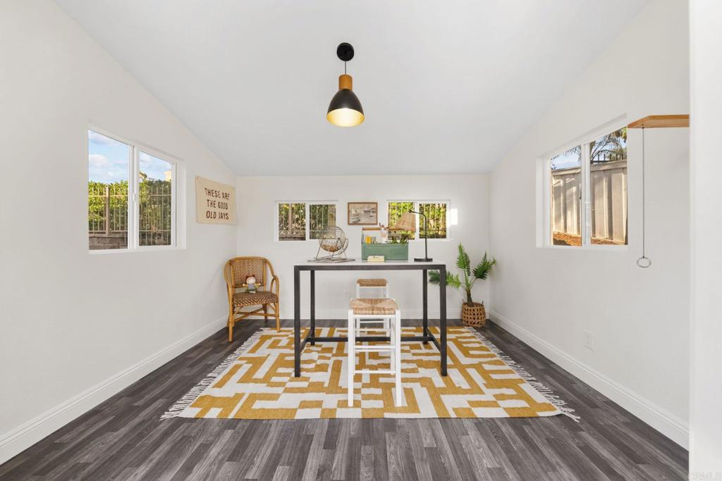 1838 Samoa Way Oceanside, CA 92054 - Photo 31 of 40 a living room with a rug and a table