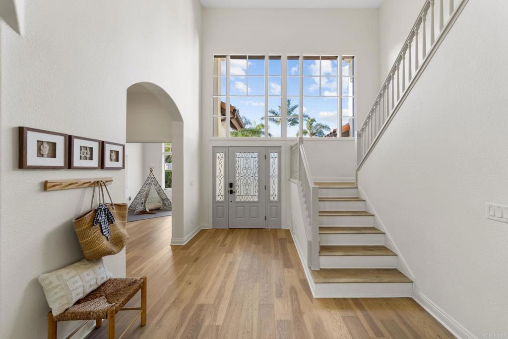 1838 Samoa Way Oceanside, CA 92054 - Photo 4 of 40 a living room with furniture and wooden floor