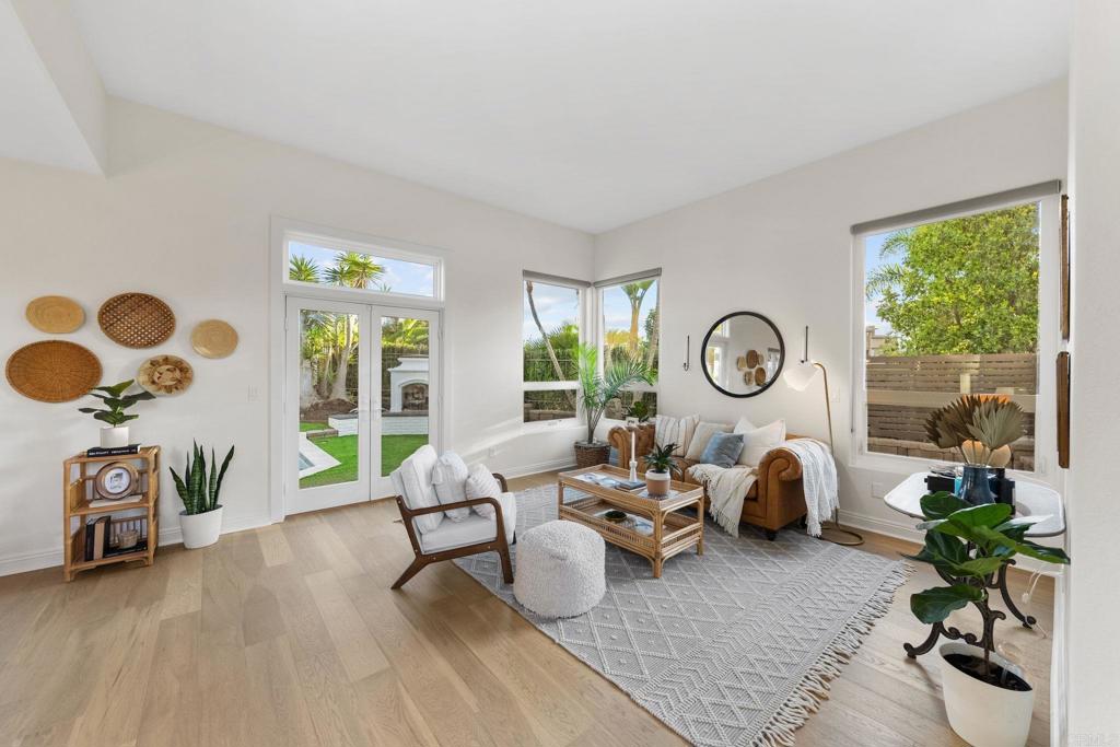 1838 Samoa Way Oceanside, CA 92054 - Photo 6 of 40 a living room with furniture and a large window