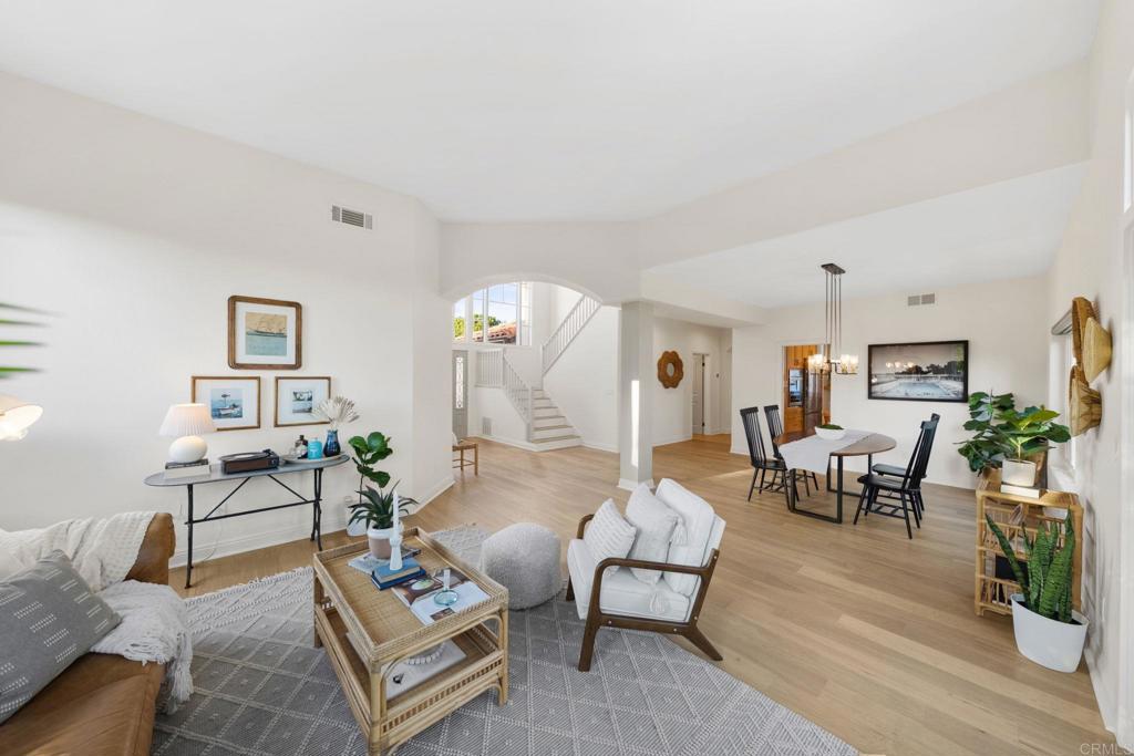 1838 Samoa Way Oceanside, CA 92054 - Photo 7 of 40 a living room with furniture and wooden floor
