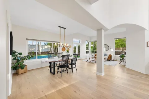a view of a livingroom with furniture and a potted plant