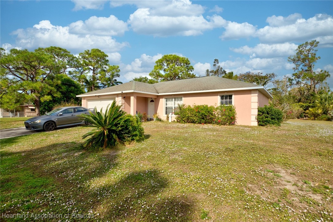 1700 Schlosser Road Sebring, FL 33870 - Photo 2 of 40 a view of a house with a backyard