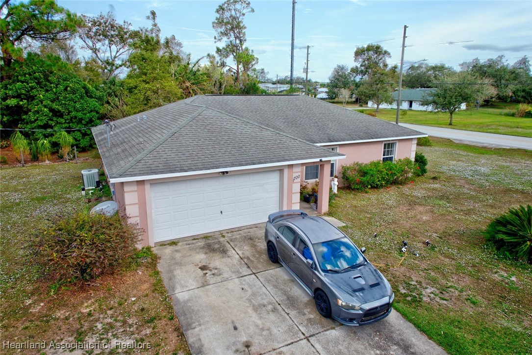 1700 Schlosser Road Sebring, FL 33870 - Photo 31 of 40 a house view with a garden space