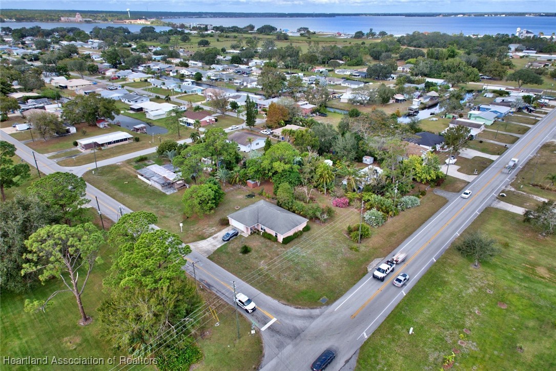 1700 Schlosser Road Sebring, FL 33870 - Photo 34 of 40 an aerial view of residential houses with outdoor space and trees