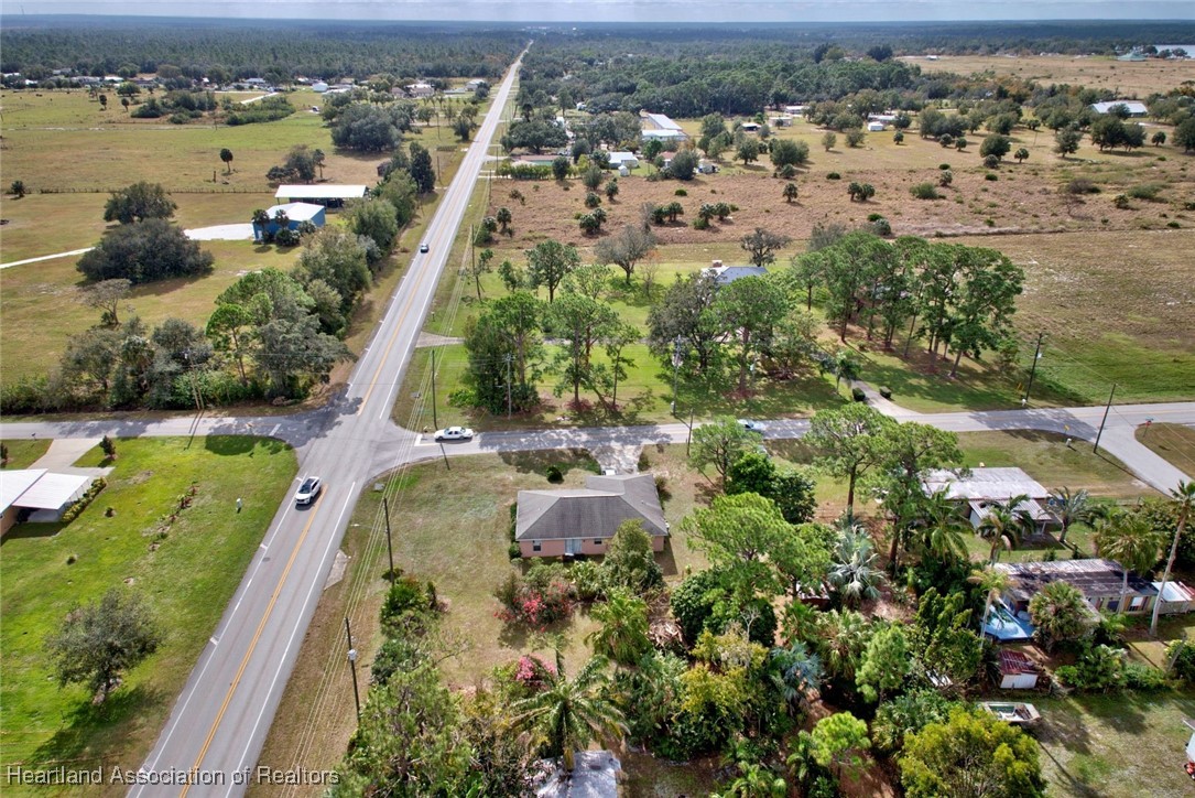 1700 Schlosser Road Sebring, FL 33870 - Photo 39 of 40 an aerial view of a city with lots of residential buildings ocean and mountain view