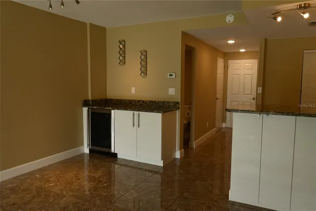 a view of a room with a large window