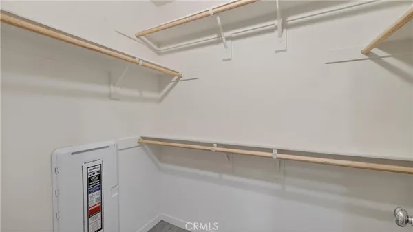 a view of an empty walk in closet