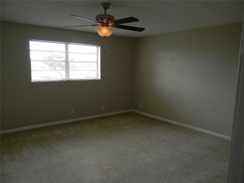 22511 Southwest 66th Avenue, Unit 409 Boca Raton, FL 33428 - Photo 8 of 9 Master Bedroom
