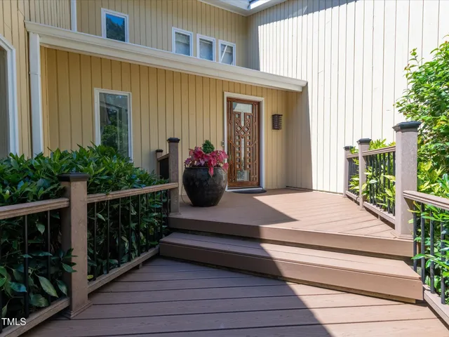 a front view of a house with stairs