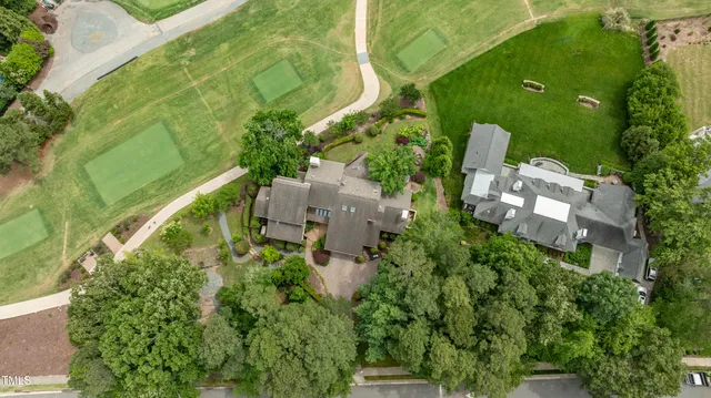 a view of swimming pool with a yard