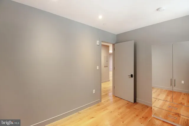 a bathroom with a shower and a toilet