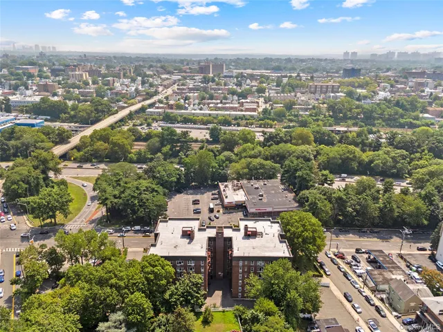an aerial view of a city with lots of residential buildings