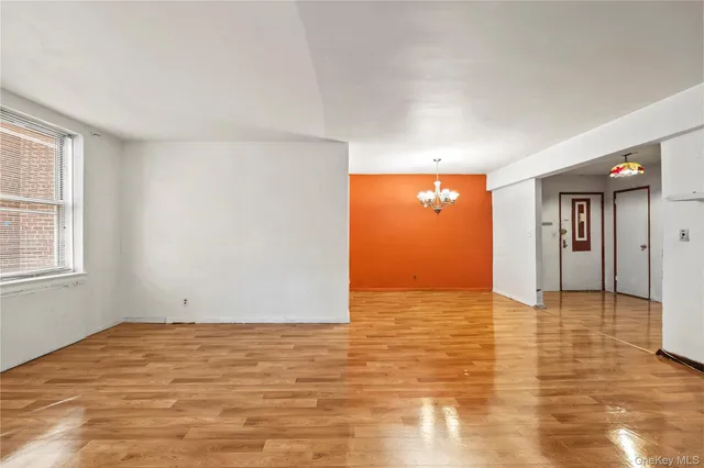 a view of an empty room and window