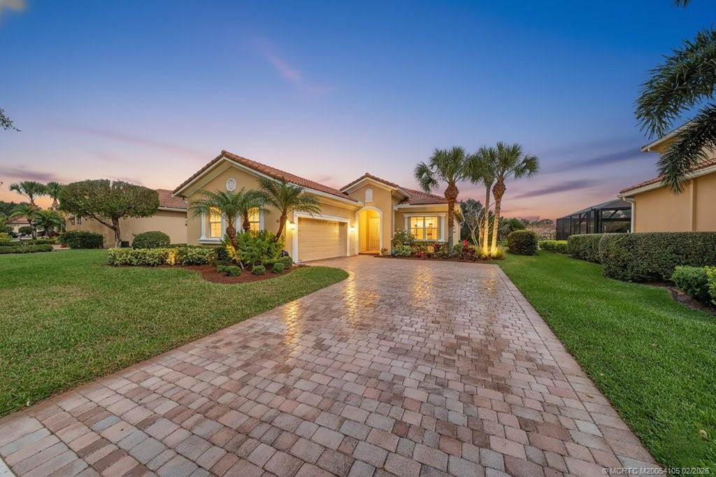 8121 Southwest Marin Drive Stuart, FL 34997 - Photo 31 of 31 a view of house with garden