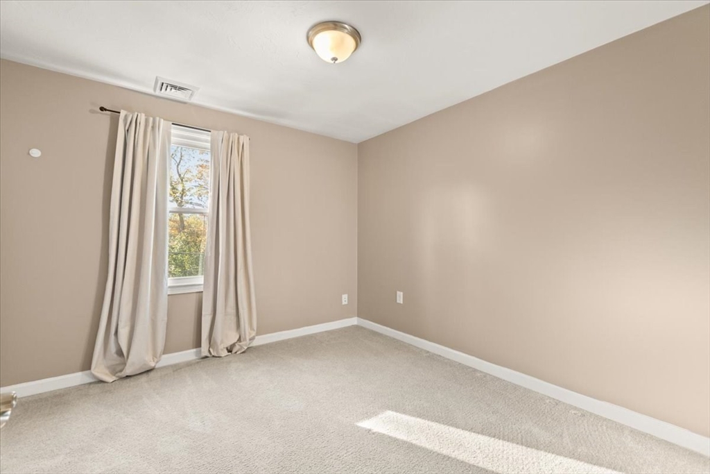 3 Federal Street, Unit 3 Blackstone, MA 01504 - Photo 15 of 27 an empty room with a empty space and a window