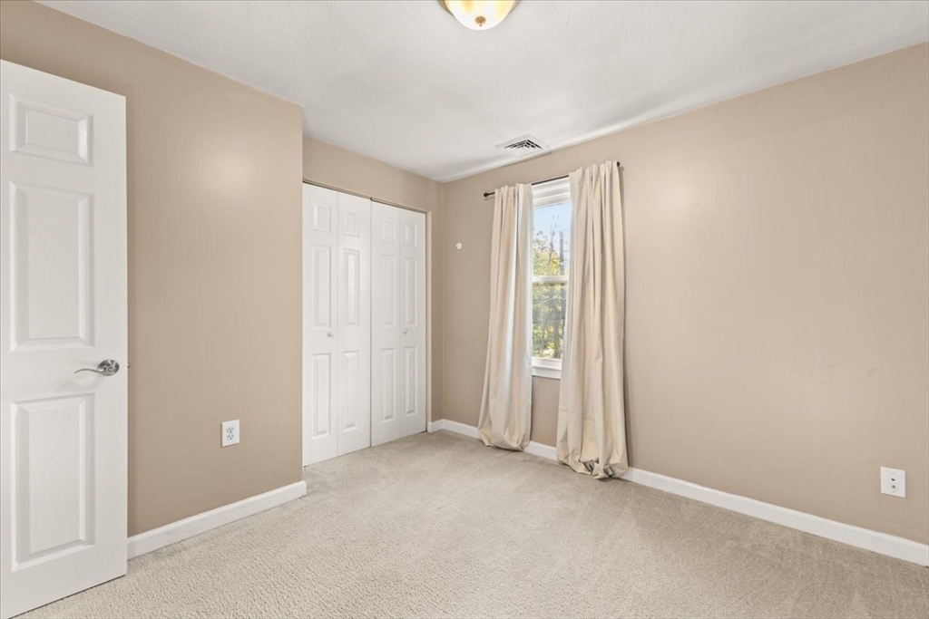 3 Federal Street, Unit 3 Blackstone, MA 01504 - Photo 16 of 27 an empty room with windows