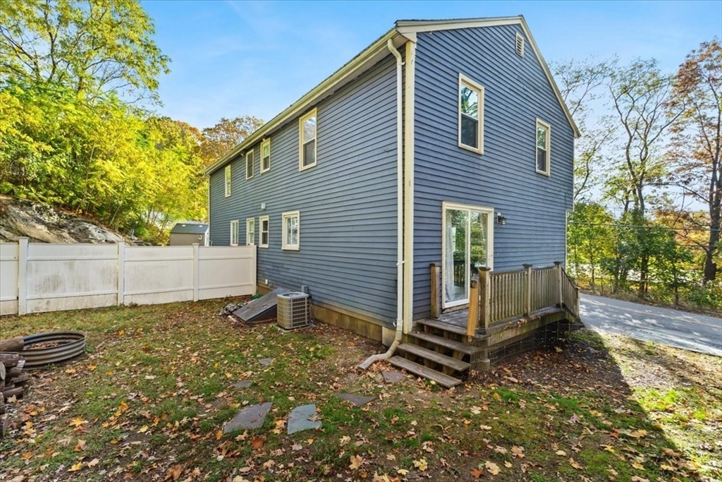 3 Federal Street, Unit 3 Blackstone, MA 01504 - Photo 2 of 27 a backyard of a house