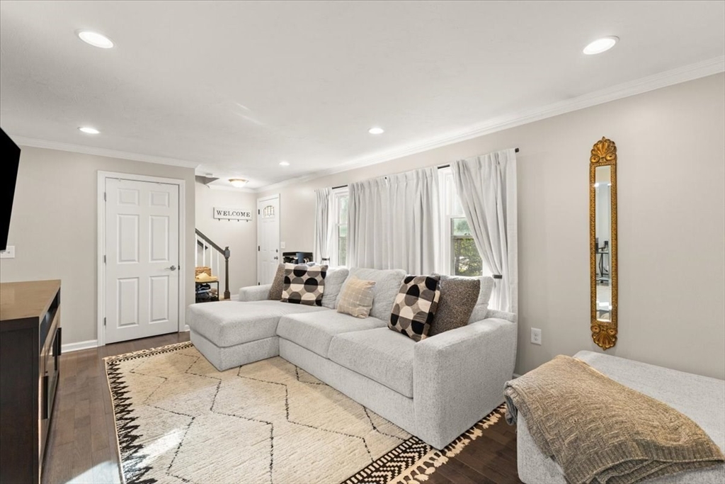 3 Federal Street, Unit 3 Blackstone, MA 01504 - Photo 6 of 27 a living room with furniture and a large window