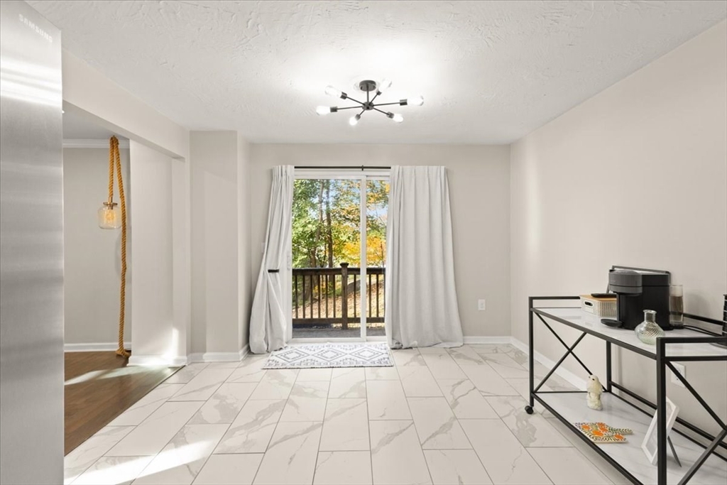 3 Federal Street, Unit 3 Blackstone, MA 01504 - Photo 10 of 27 a view of a livingroom with a furniture