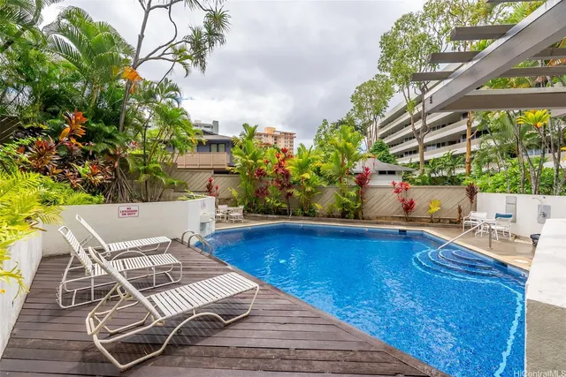 a view of outdoor space yard swimming pool and furniture