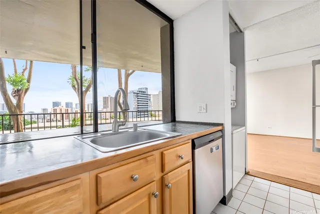 a view of a sink and a window