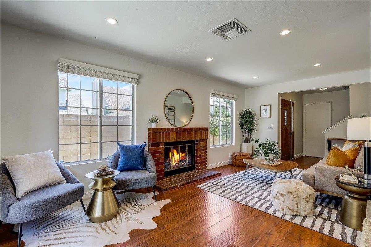 238 Mavis Drive Pleasanton, CA 94566 - Photo 13 of 53 a living room with furniture and a fireplace