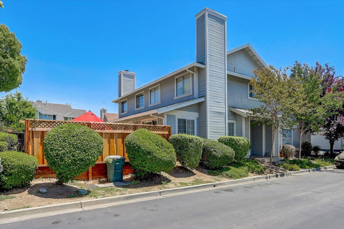 238 Mavis Drive Pleasanton, CA 94566 - Photo 2 of 53 a front view of a house with a yard and garage