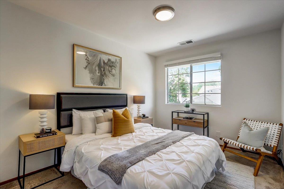 238 Mavis Drive Pleasanton, CA 94566 - Photo 28 of 53 a bedroom with a bed and wooden floor