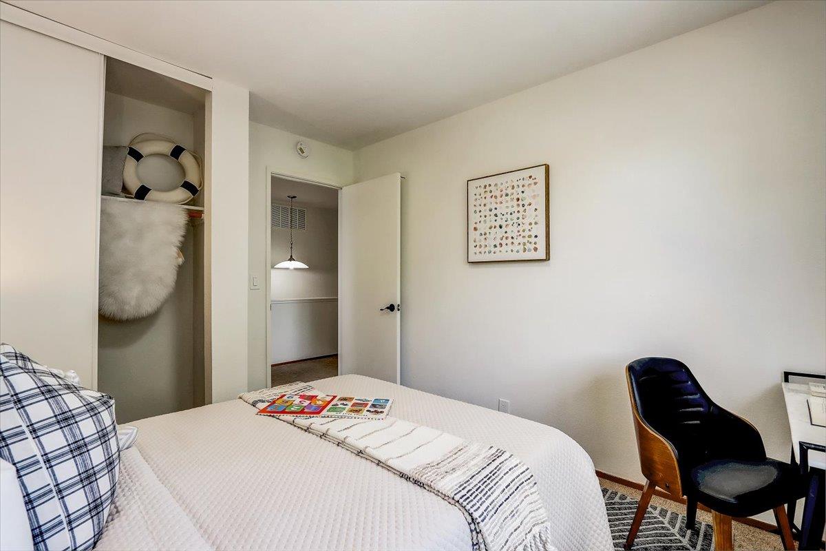238 Mavis Drive Pleasanton, CA 94566 - Photo 29 of 53 a bedroom with a bed and a chair in it