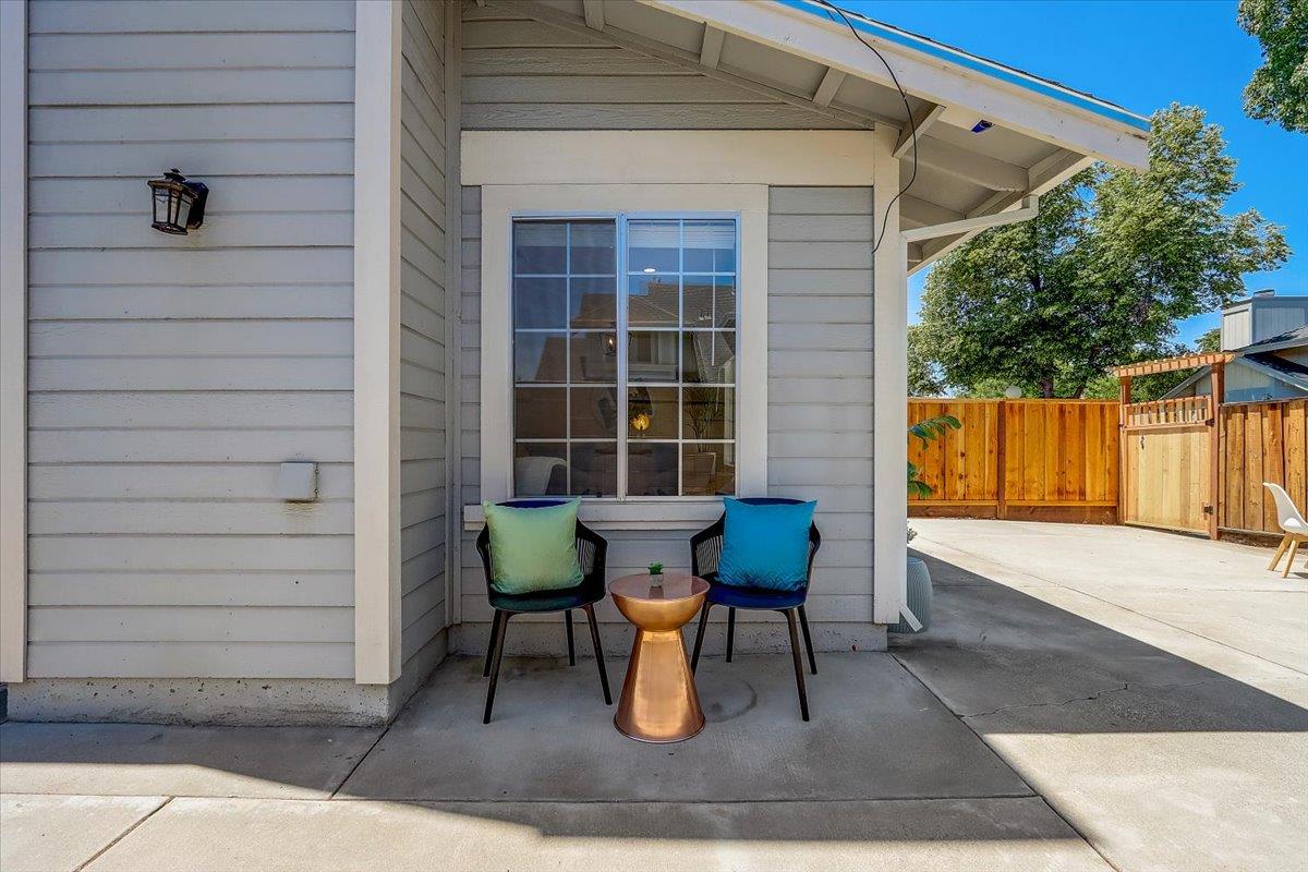 238 Mavis Drive Pleasanton, CA 94566 - Photo 35 of 53 a view of a chairs and table in the back yard of the house