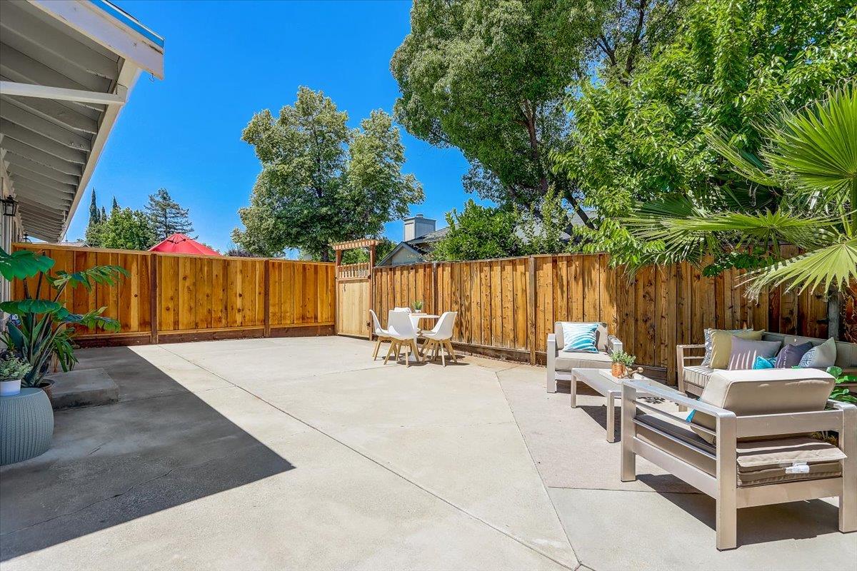 238 Mavis Drive Pleasanton, CA 94566 - Photo 39 of 53 a backyard of a house with table and chairs