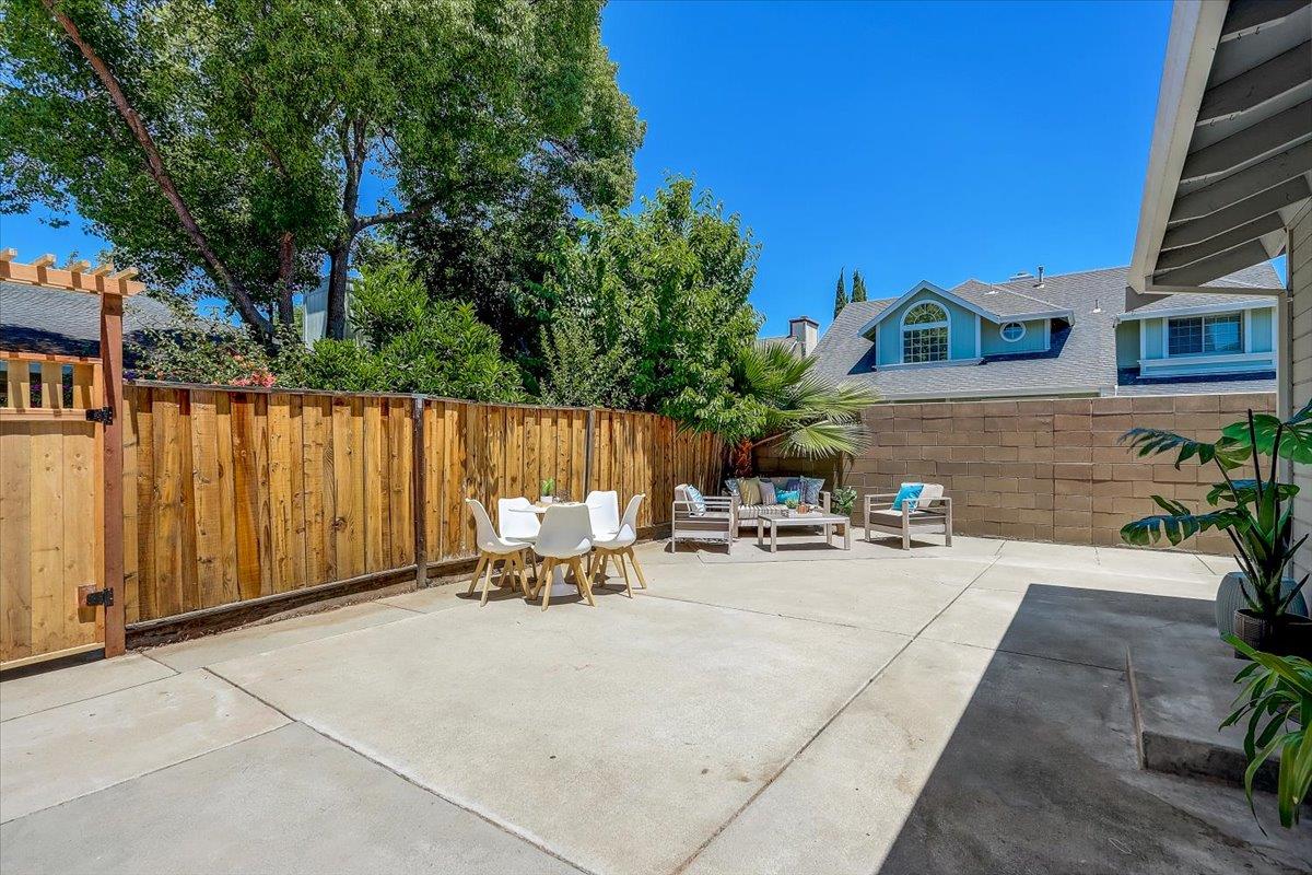 238 Mavis Drive Pleasanton, CA 94566 - Photo 40 of 53 a view of a chair and tables in the patio of the house