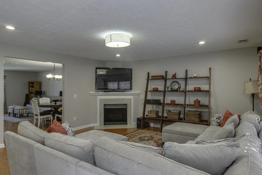 3973 Stephens Ridge Way Antioch, TN 37013 - Photo 7 of 19 a living room with furniture and a fireplace