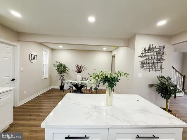 a view of a living room and dining room