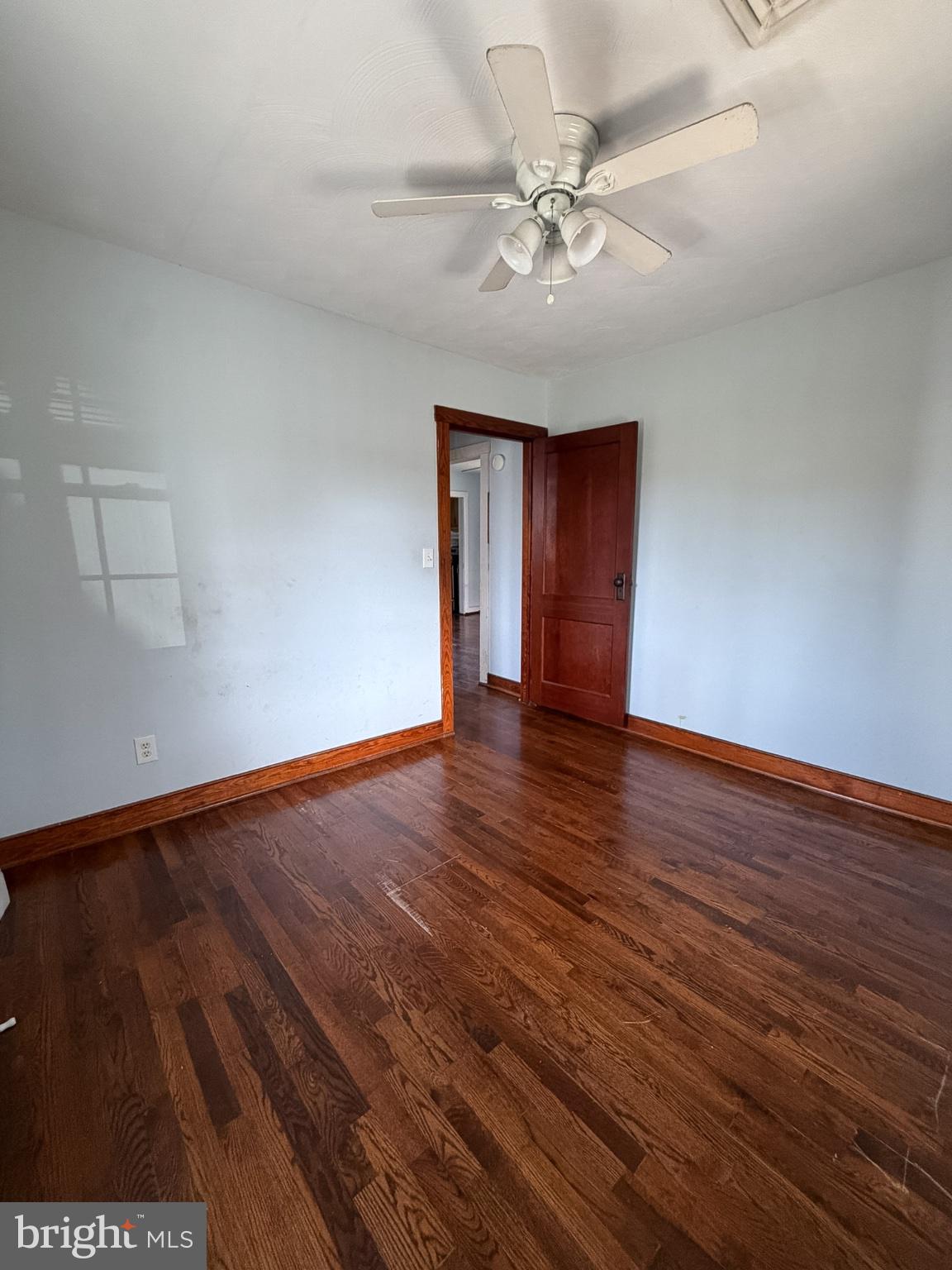 2929 Packer Street Winchester, VA 22601 - Photo 12 of 38 a view of an empty room with wooden floor