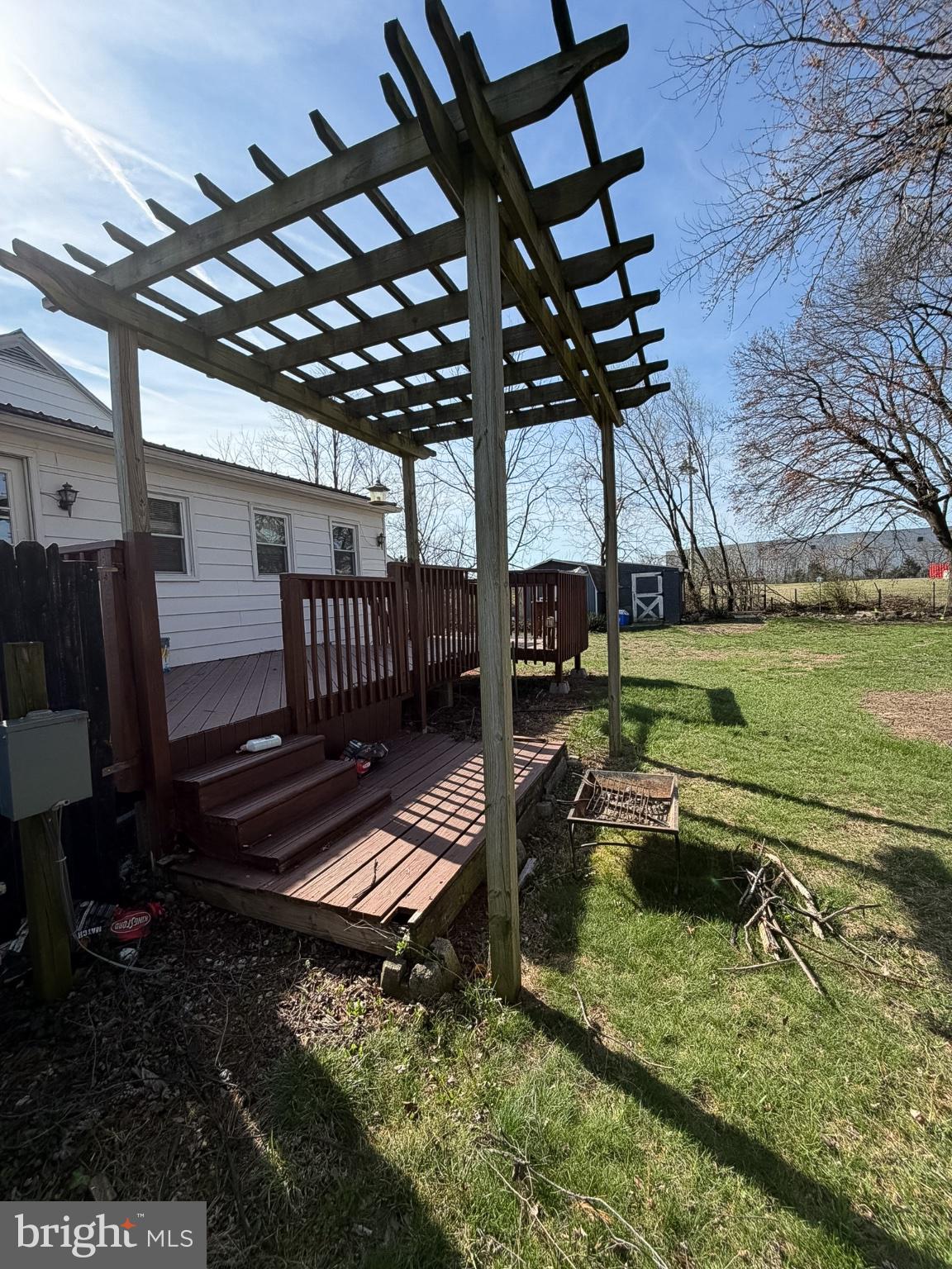 2929 Packer Street Winchester, VA 22601 - Photo 27 of 38 a backyard of a house with barbeque oven table and chairs