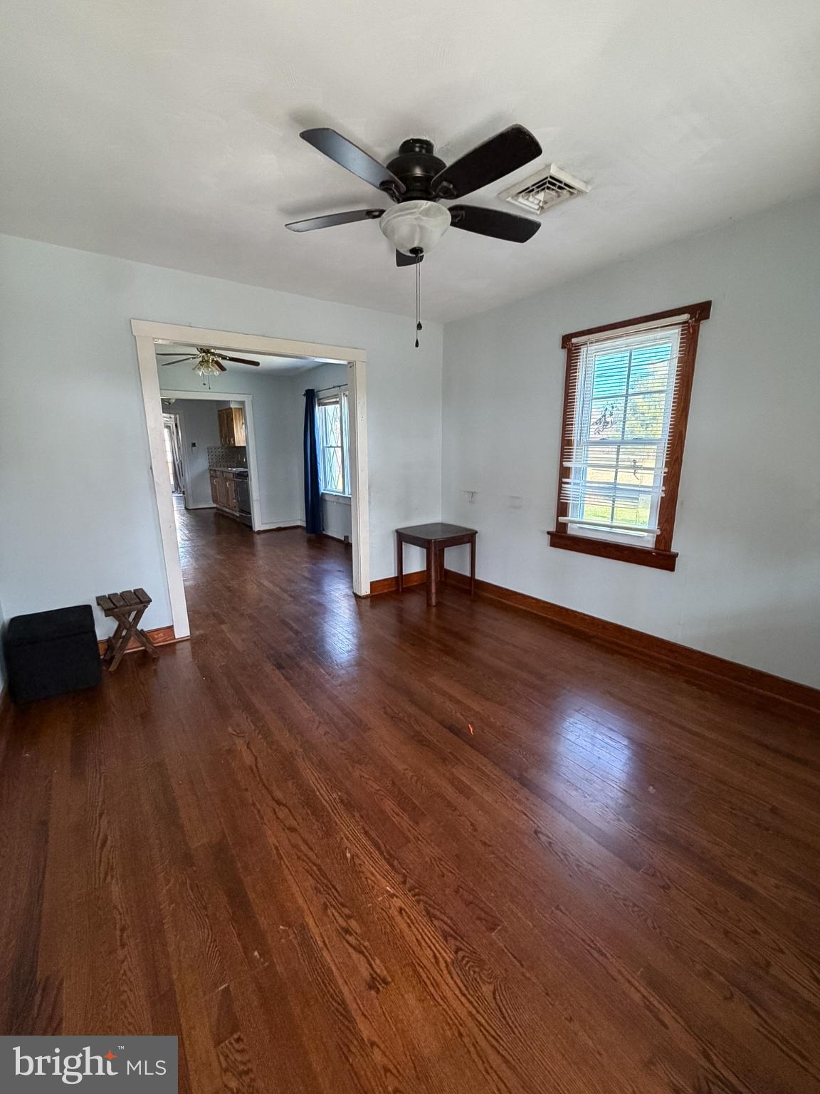 2929 Packer Street Winchester, VA 22601 - Photo 5 of 38 a view of empty room with wooden floor and fan
