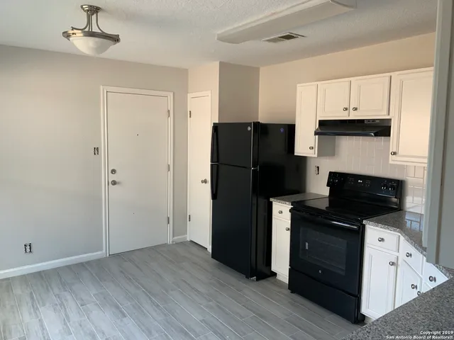 a house view with a backyard