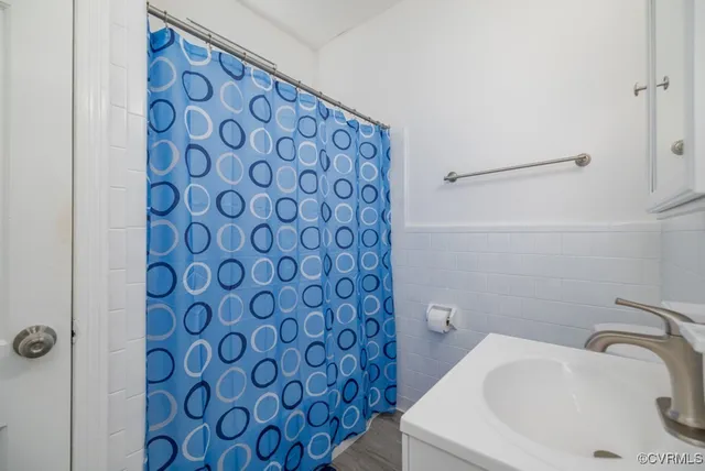 a bathroom with a sink and a bathtub