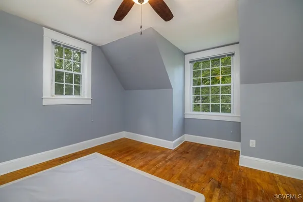 an empty room with windows