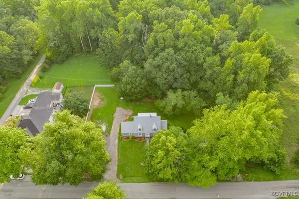 a front view of a house with yard