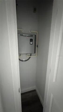 a bathroom with a granite countertop toilet sink and shower