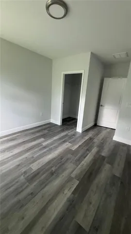 a bathroom with a toilet and a bathtub